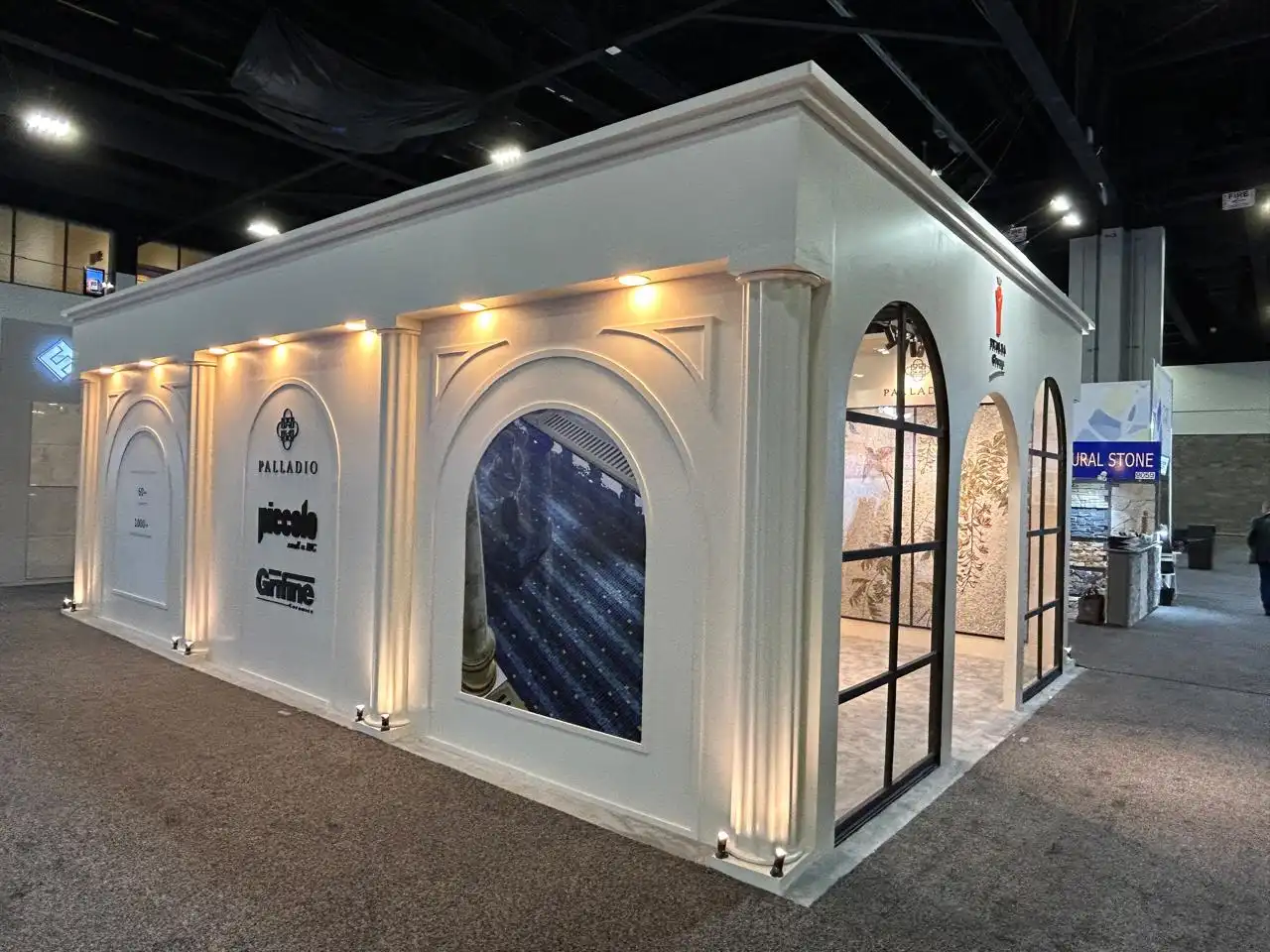 exhibition stand team working at Atlanta trade show booth setup, trade show booth installation team preparing exhibit, exhibition stand builders working on booth setup, professional trade show exhibit setup crew, Atlanta exhibition booth assembly team